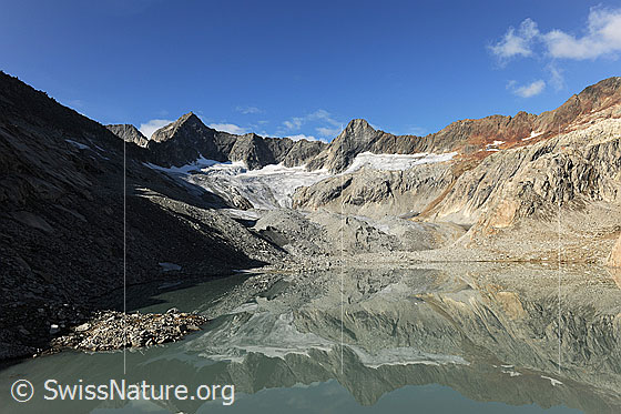 Foto: Gruebengletscher und Gruebensee mit Spiegelung.
Gipfel: Gross Diamantstock - Hiendertelltihorn
