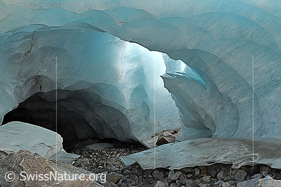 Photo: Ice cave (in the Oberaar Glacier. Subglacial meltwater channel with light shining in from the side and beautifully colored glacier ice. Just a few weeks later, this ice cave was history.