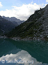 F014431: Spiegelung von Wolken und Bergen im Zervreilasee