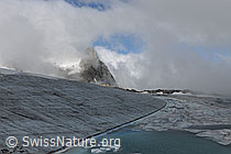 Photo: Nebelstimmung über Gletscher und Gletschersee